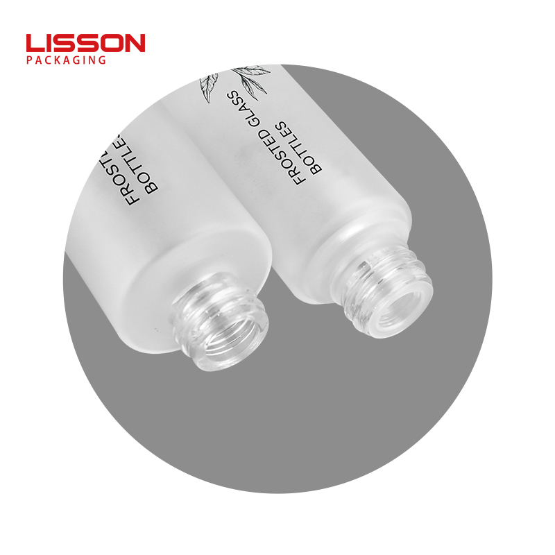 Cosmetic glass bottle with pump