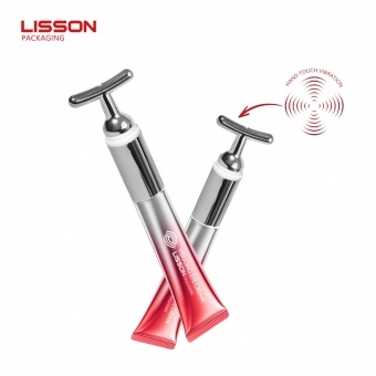 عبوة كريم العين على شكل حرف T مع خاصية التدليك الاهتزازي، تحمل شعار العلامة التجارية