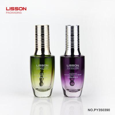 Eye cream bottle with vibration applicator